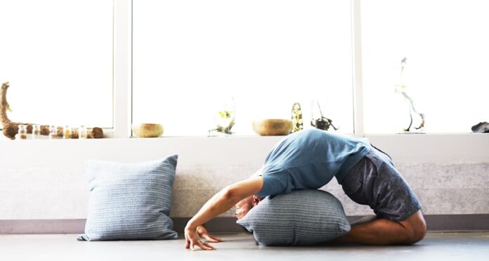 man doing yoga session